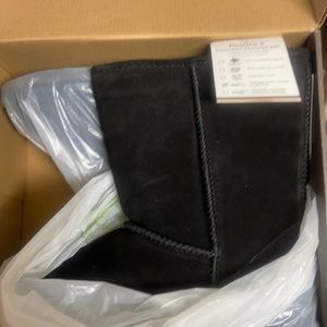 Brand new boots. Size 10/11. Never been worn.